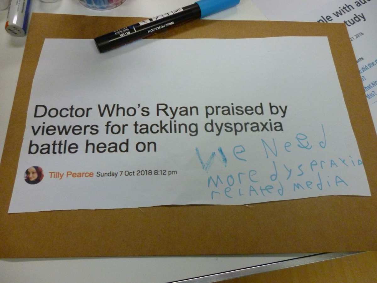 Visitors protest sign.