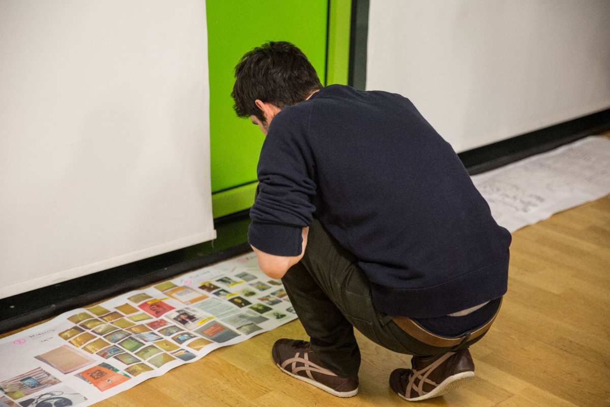 Visitor looking at the research.