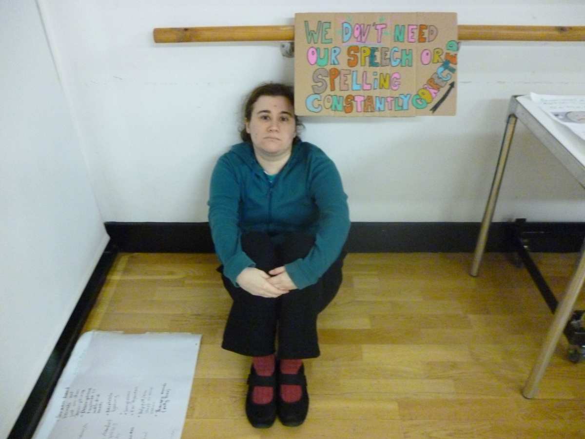 Participant protesting with sign.