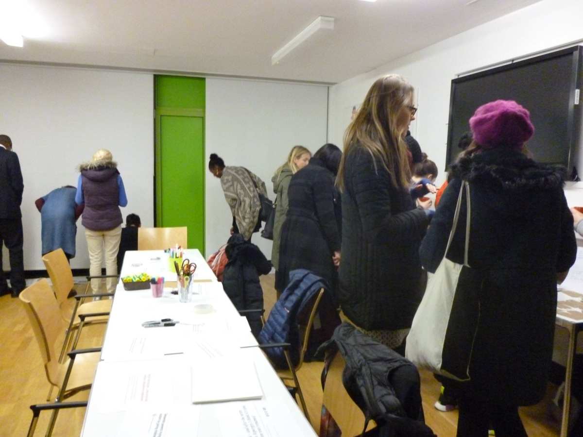 Visitors looking at the research.